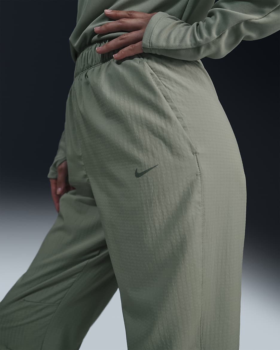 Nike Dri-FIT Fast Women's Mid-Rise 7/8 Warm-Up Running Trousers - Jade Horizon