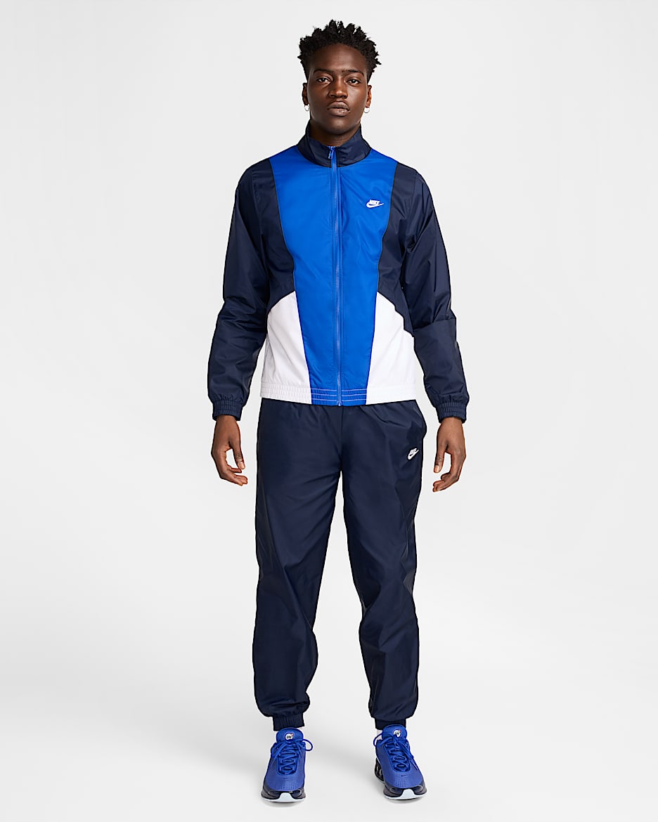 Nike Club geweven trainingspak voor heren - Obsidian/Wit/Game Royal/Wit