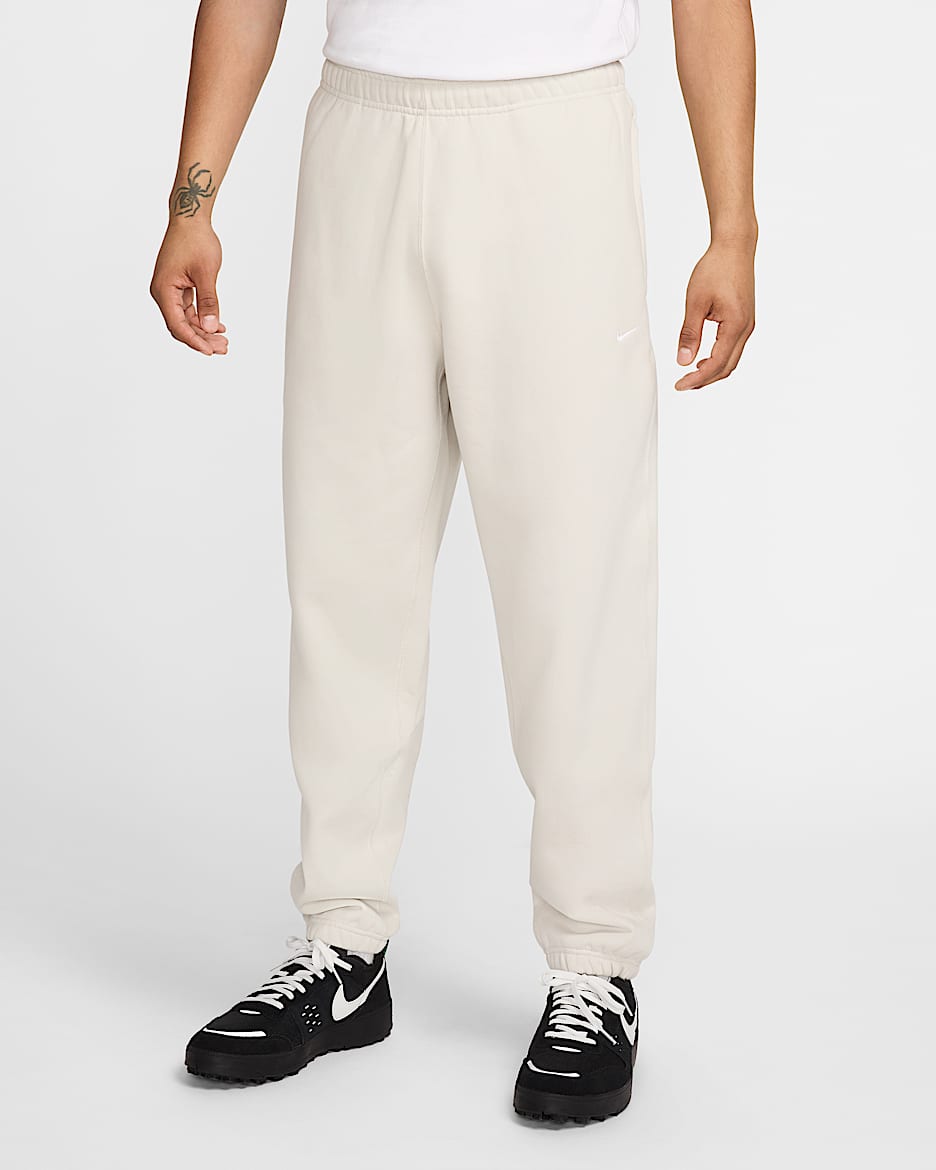 Pantalon en tissu Fleece Nike Solo Swoosh pour Homme - Light Bone/Blanc