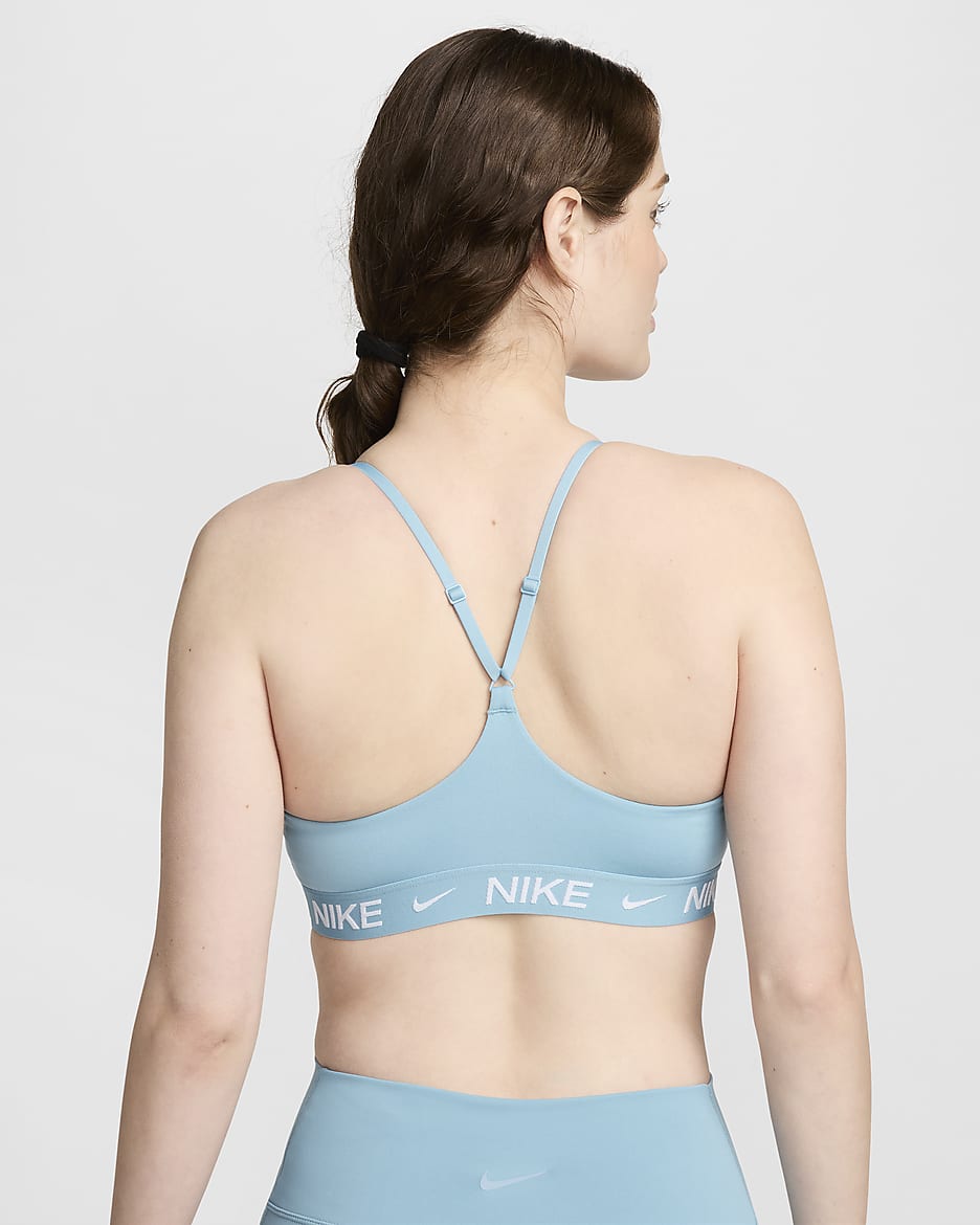 Bra deportivo ajustable acolchado para mujer Nike Indy Light Support - Denim turquesa