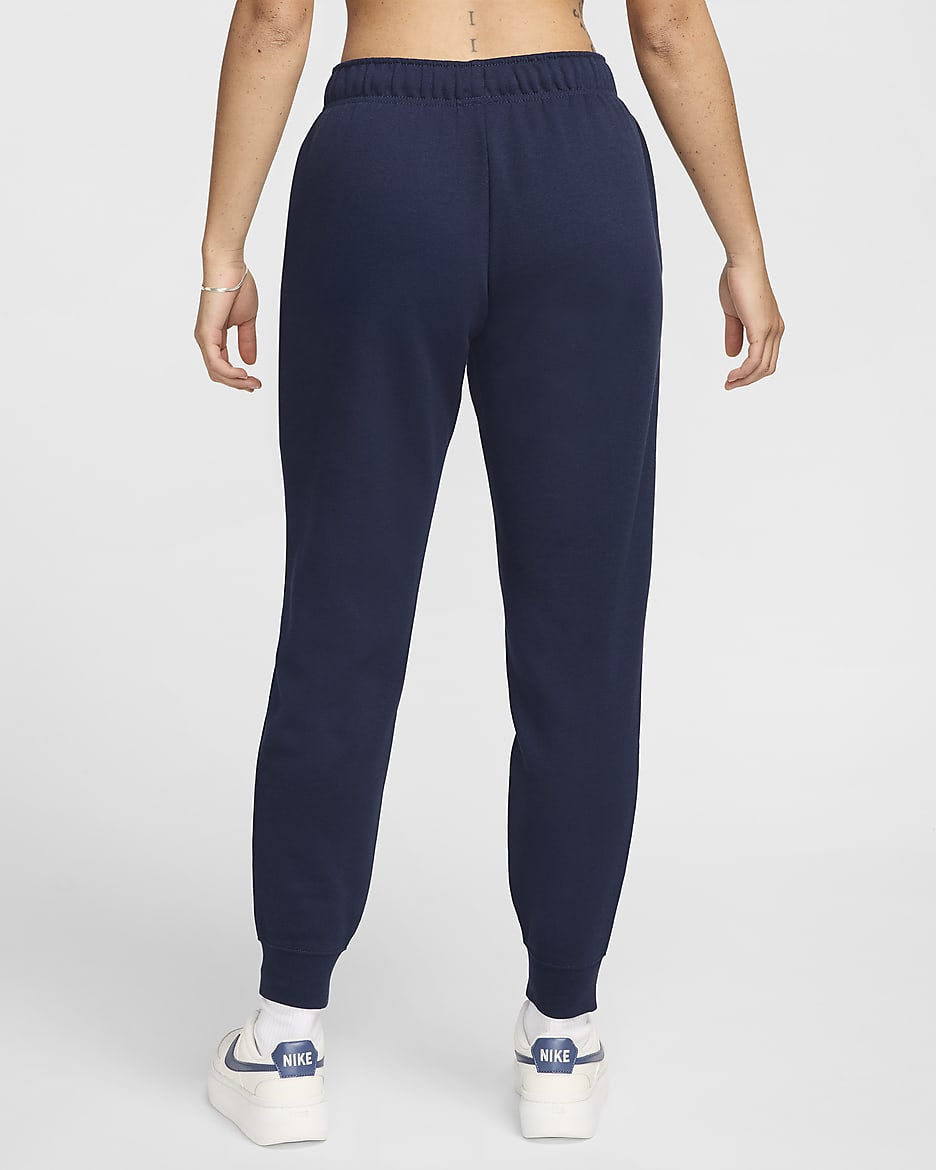 Joggers de tiro medio para mujer Nike Sportswear Club Fleece - Obsidiana/Blanco