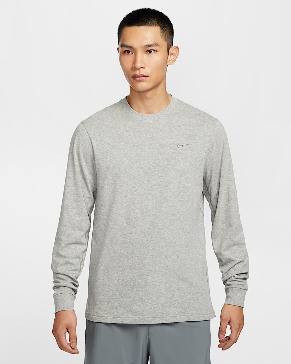 ナイキ プライマリー メンズ Dri-FIT ロングスリーブ バーサタイル トップ - ダークグレーヘザー/ヘザー/スモークグレー