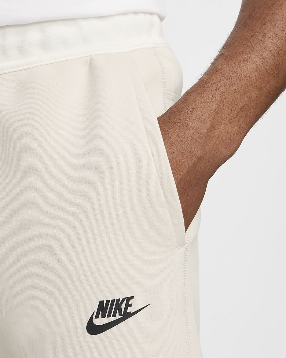 Pánské běžecké kalhoty Nike Sportswear Tech Fleece - Light Orewood Brown/Sail/Černá