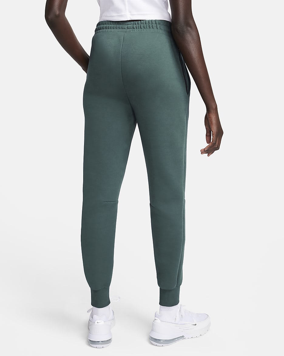 Pantalon de jogging taille mi-haute Nike Sportswear Tech Fleece pour femme - Deep Jungle/Noir