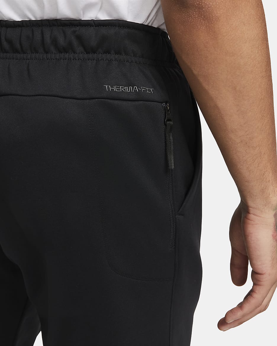 Pantalon de fitness fuselé Therma-FIT Nike Therma pour homme - Noir/Noir/Blanc