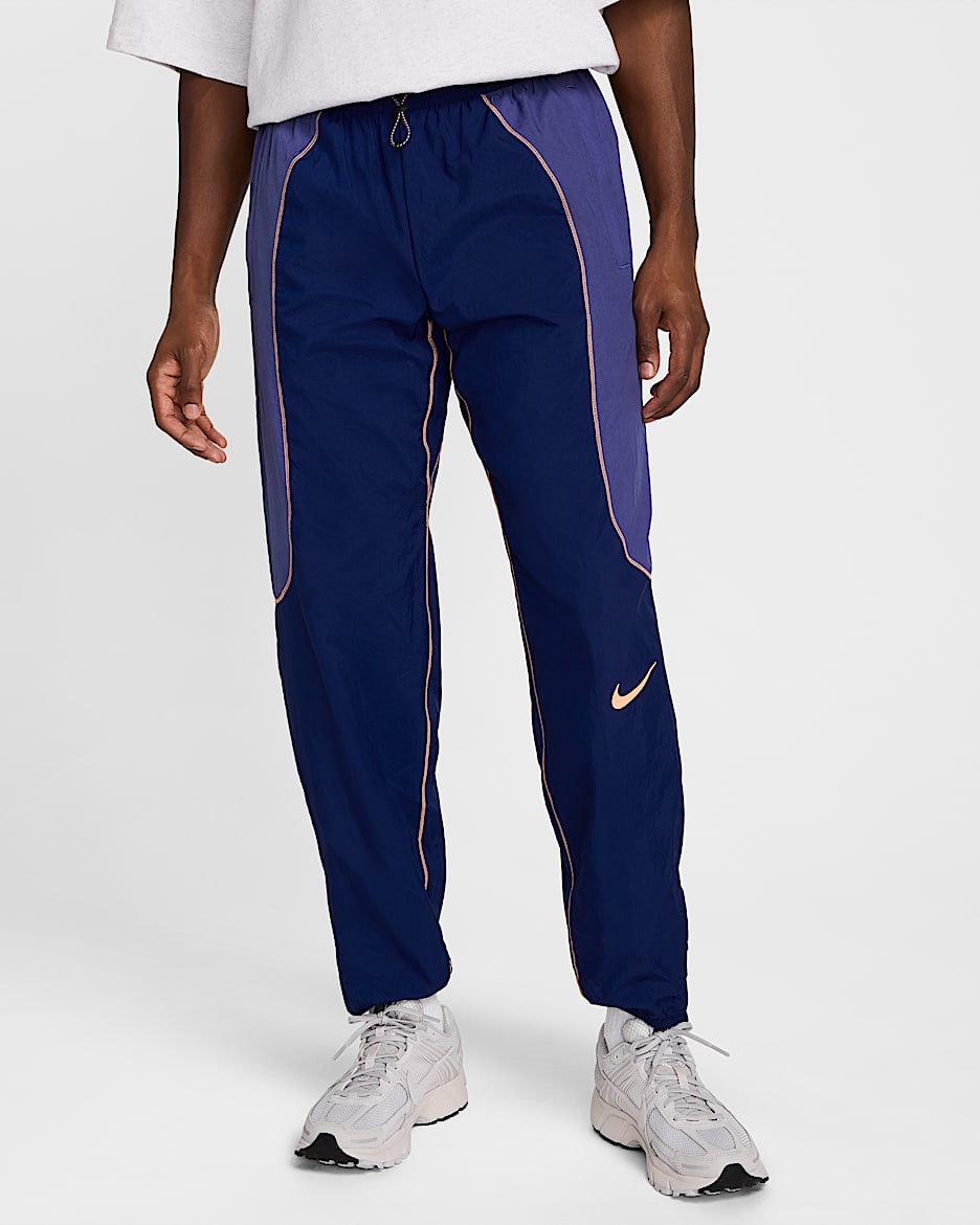 Nike Strike+ Men's Water-Repellent Football Pants - Blue Void/Dark Purple Dust/Orange Pulse/Orange Pulse
