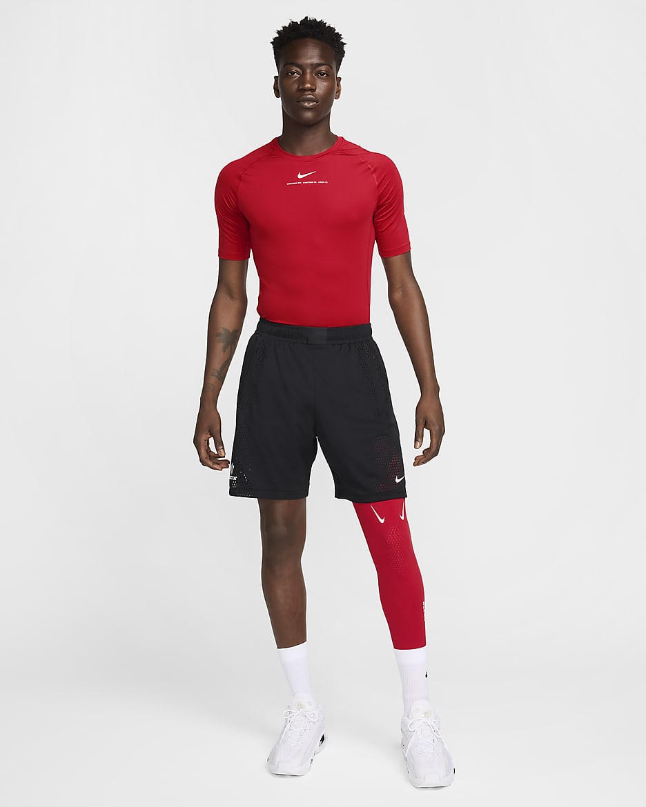 NOCTA Single-Leg-Basketball-Tights für Herren (links) - University Red/Weiß