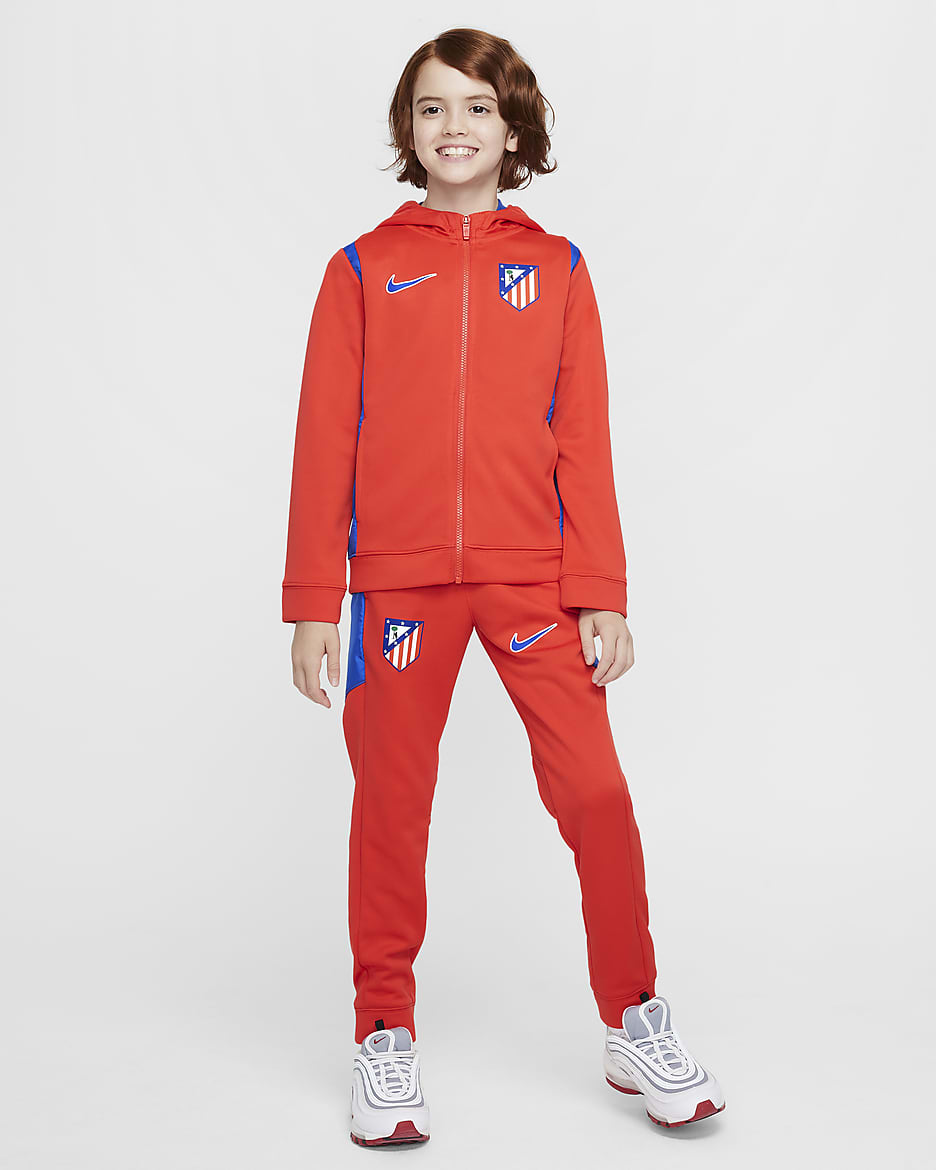 Atlético Madrid Home Older Kids' Nike Football Woven Tracksuit - Light Crimson/Game Royal/Game Royal