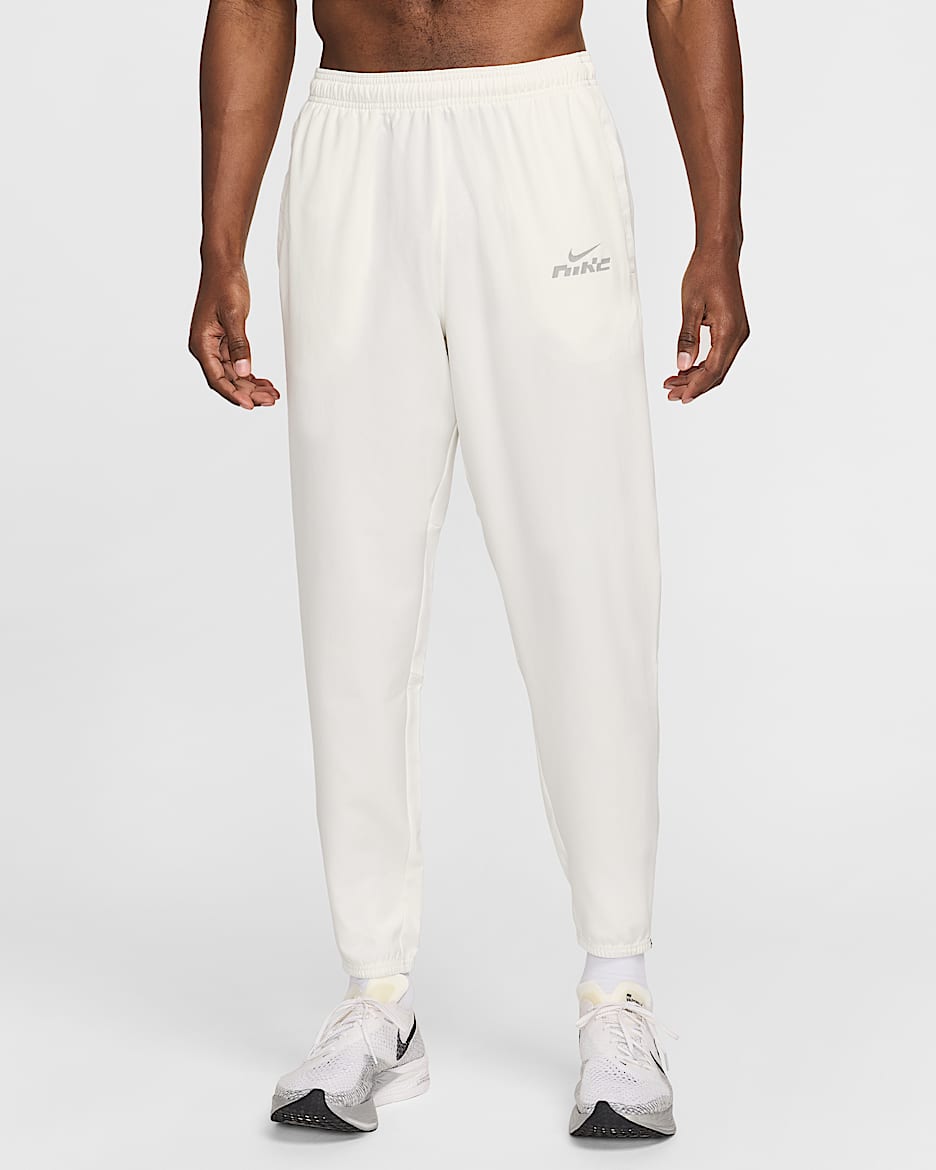 Pantaloni da running in tessuto Dri-FIT Nike Challenger Flash – Uomo - Sail