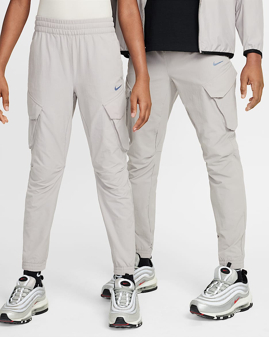 Pantaloni cargo Nike Sportswear City Utility – Ragazzo/a - College Grey/Nero