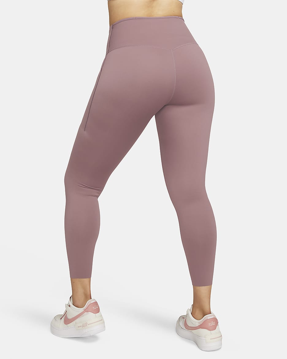 Leggings de tiro alto de 7/8 de sujeción firme con bolsillos para mujer Nike Go - Malva humeante/Negro