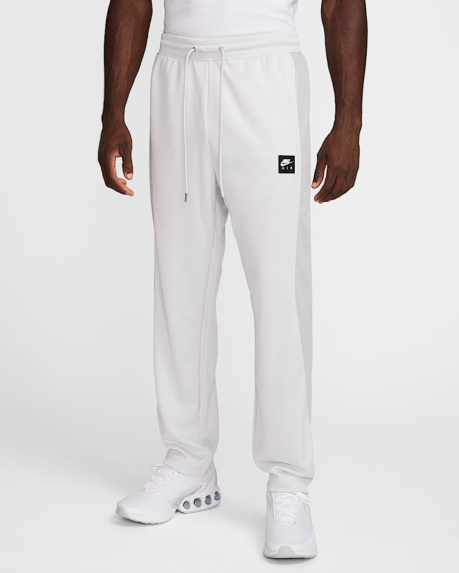 Pants deportivos de tejido Knit de poliéster para hombre Nike Air - Polvo fotón/Gris humo claro/Negro