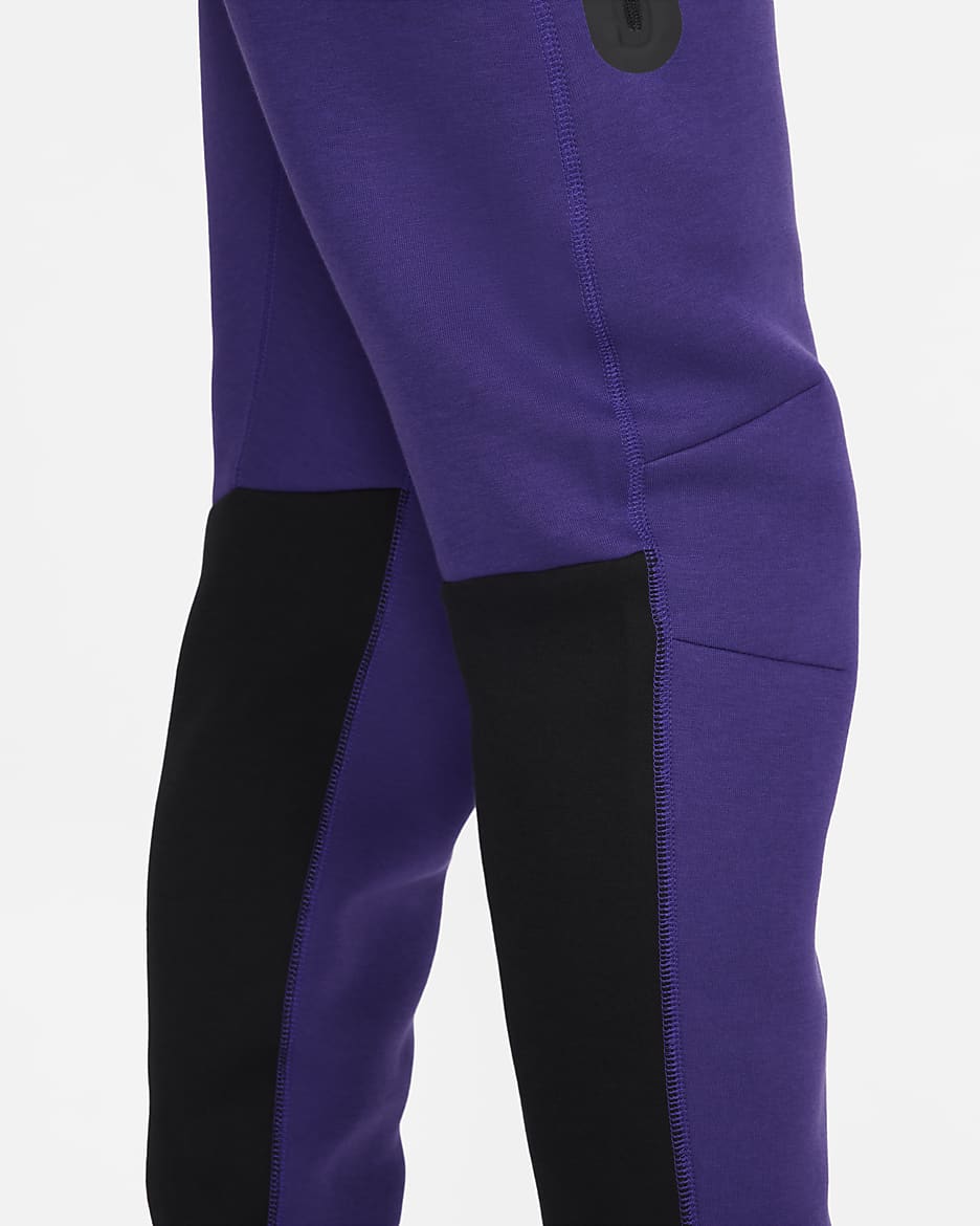 Joggingbyxor Nike Sportswear Tech Fleece för män - Field Purple/Svart