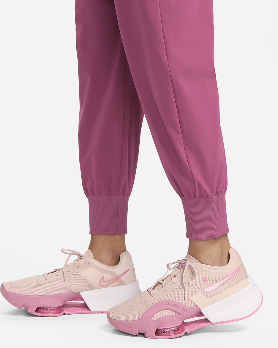 Nike Dri-FIT Bliss Women's Mid-Rise 7/8 Joggers - Rosewood/Clear