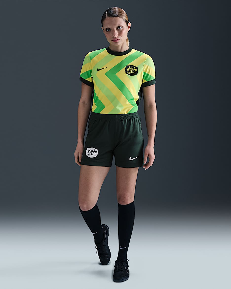 Replika dámských domácích fotbalových kraťasů Nike Dri-FIT Austrálie Stadium 2025/26 - Pro Green/Bílá