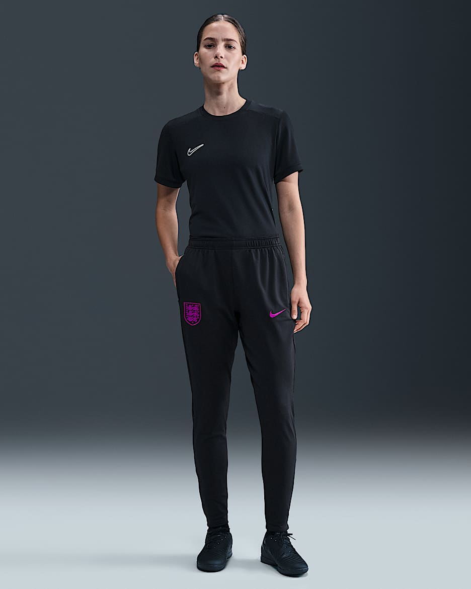 Dámské pleteninové fotbalové kalhoty Nike Dri-FIT Anglie Strike - Černá/Vivid Purple