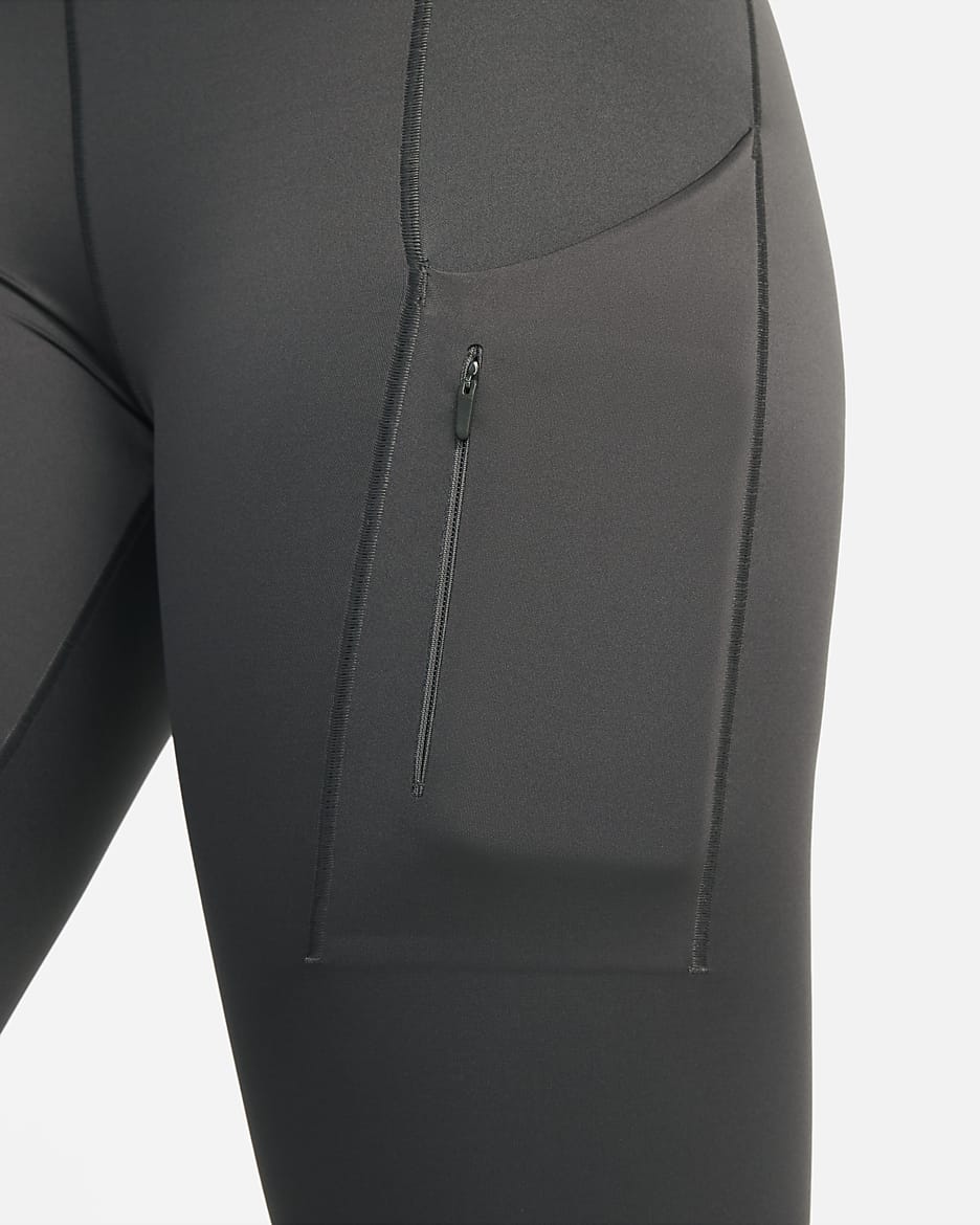 Leggings cortos de tiro medio y sujeción firme con bolsillos para mujer Nike Go - Ceniza medio/Negro