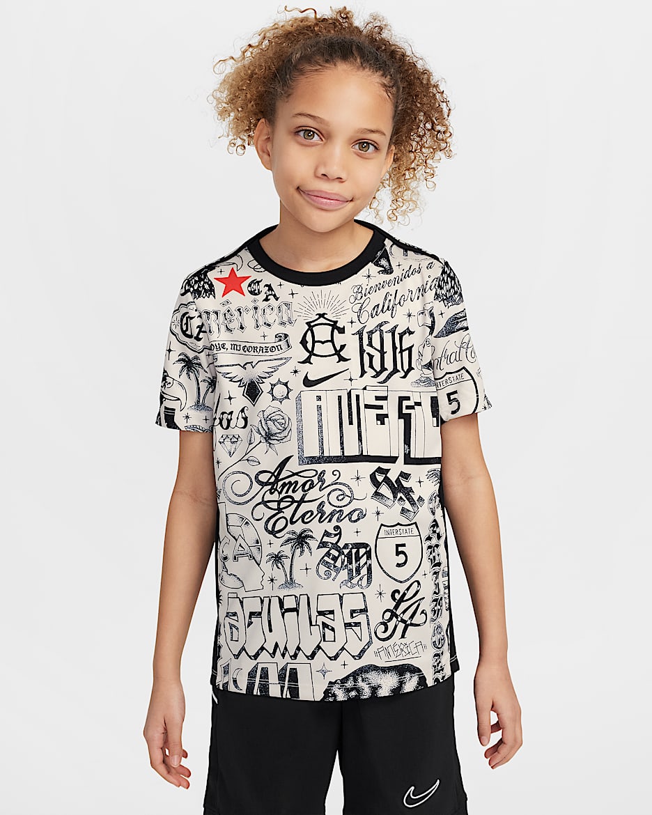 Playera de fútbol de manga corta Nike Dri-FIT para antes del partido para niños talla grande Club América Academy Pro SE - Marrón verdoso claro/Negro/Negro