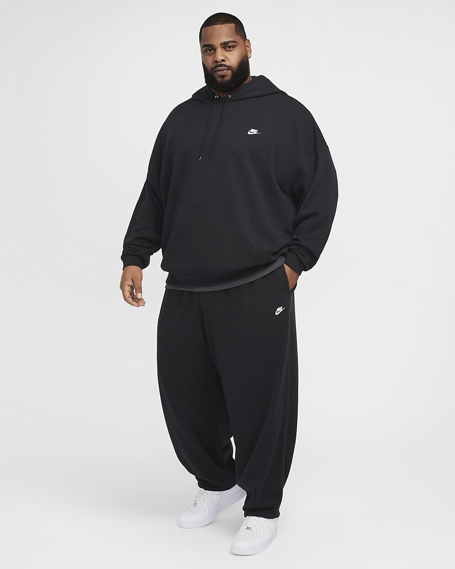 Pantaloni oversize in French Terry Nike Club Fleece – Uomo - Nero/Nero/Bianco