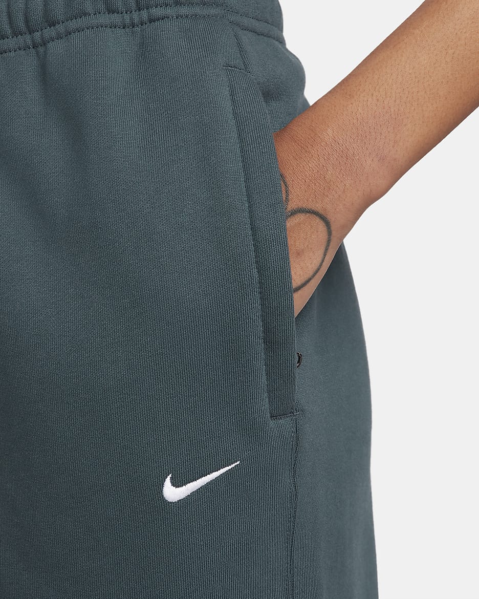 Pantaloni in fleece Nike Solo Swoosh - Donna - Deep Jungle/Bianco