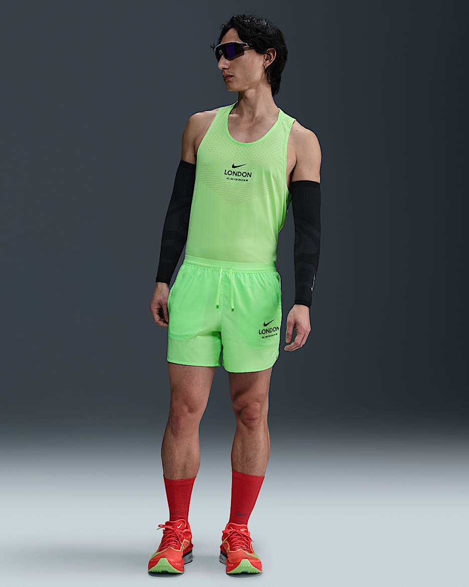 Short de running avec sous-short intégré Dri-FIT Nike Stride 13 cm pour homme - Lime Blast