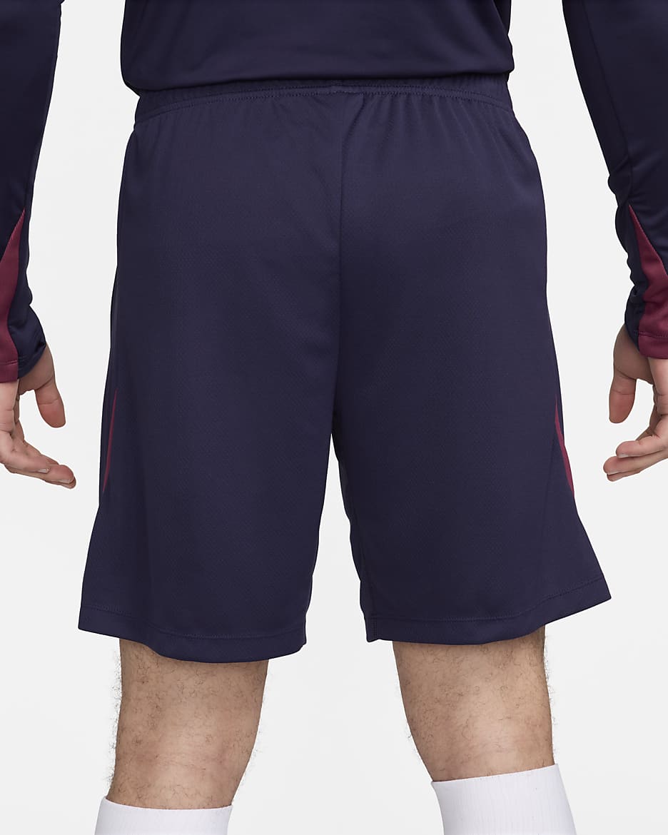 Shorts da calcio in maglia Nike Dri-FIT Inghilterra Strike – Uomo - Purple Ink/Rosewood/Bianco