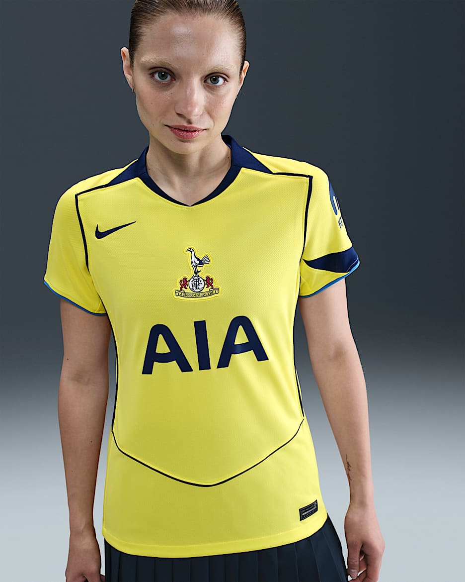 Replika dámského třetího fotbalového dresu Nike Dri-FIT Total 90 Tottenham Hotspur Stadium 2025/26 - Dynamic Yellow/Blue Void/Pacific Blue/Blue Void