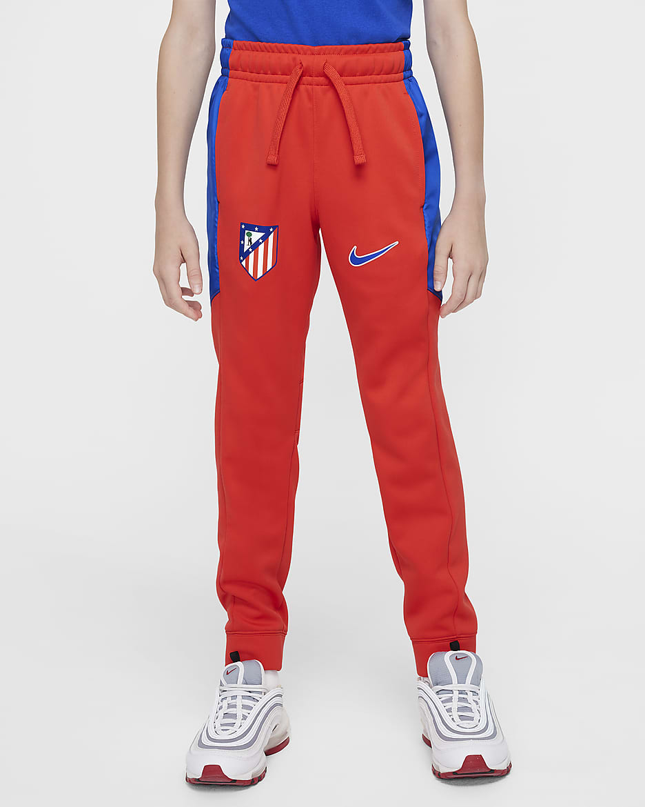 Dres piłkarski z tkaniny dla dużych dzieci Nike Atlético Madryt (wersja domowa) - Light Crimson/Game Royal/Game Royal