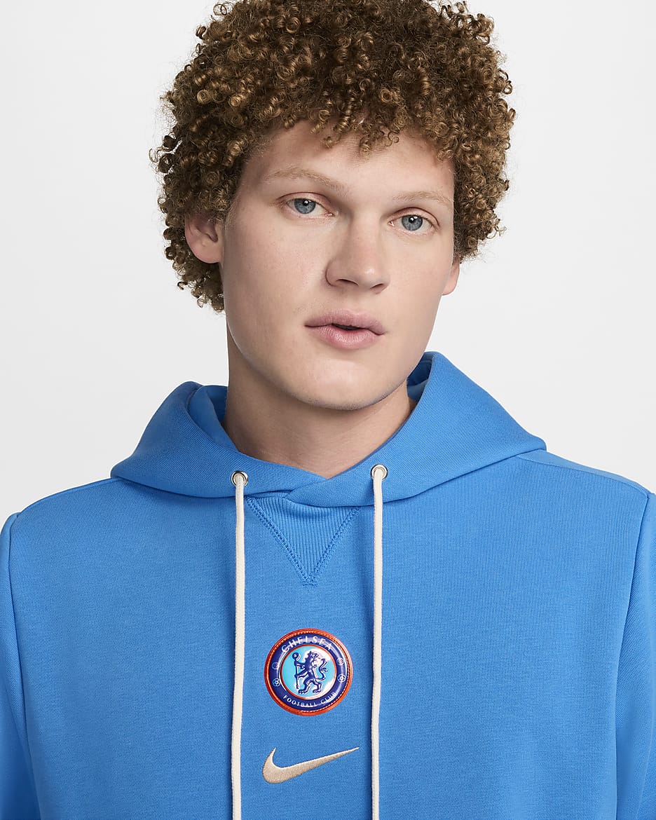 Chelsea F.C. Standard Issue Men's Nike Dri-FIT Football Pullover Hoodie - Light Photo Blue/Guava Ice