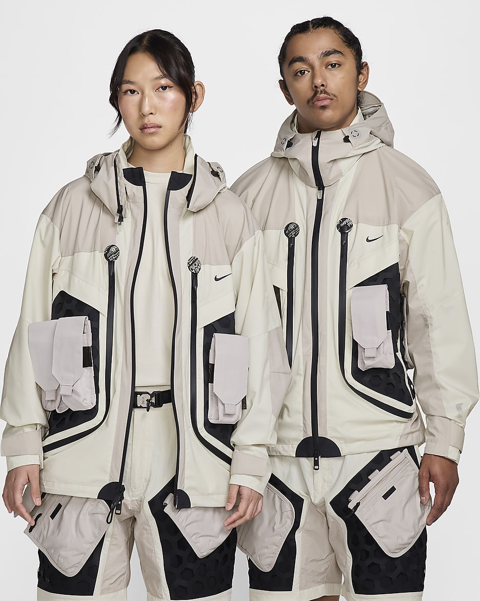 Chaqueta Mariposa Nike ISPA - Hueso claro/Gris partícula/Negro