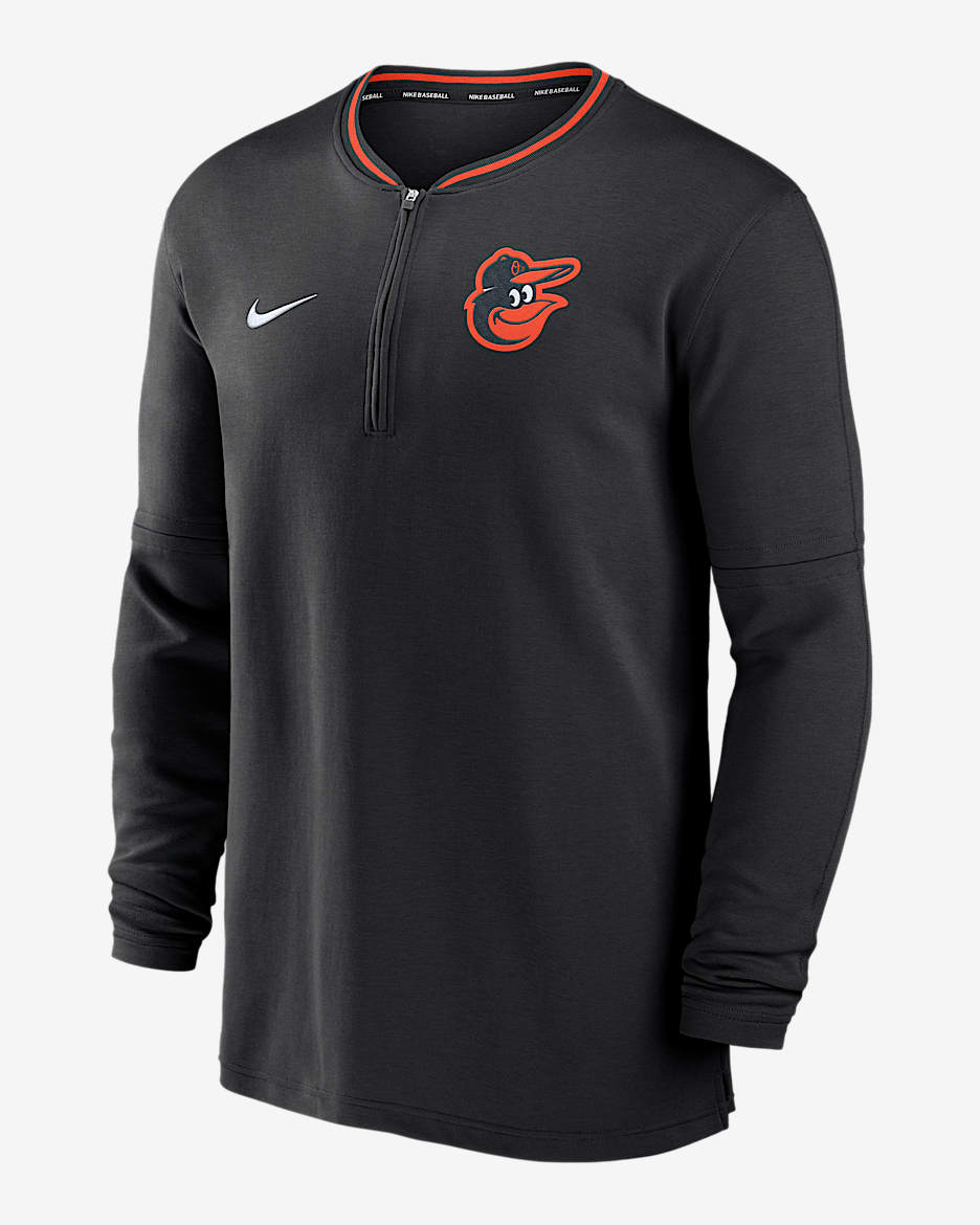 Playera de manga larga Nike Dri-FIT de la MLB de medio cierre para hombre Baltimore Orioles Authentic Collection - Negro