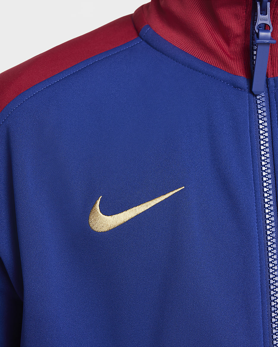 FC Barcelona Academy Pro Thuis Nike Dri-FIT voetbalvolksliedjack voor kids - Deep Royal Blue/Noble Red/Club Gold