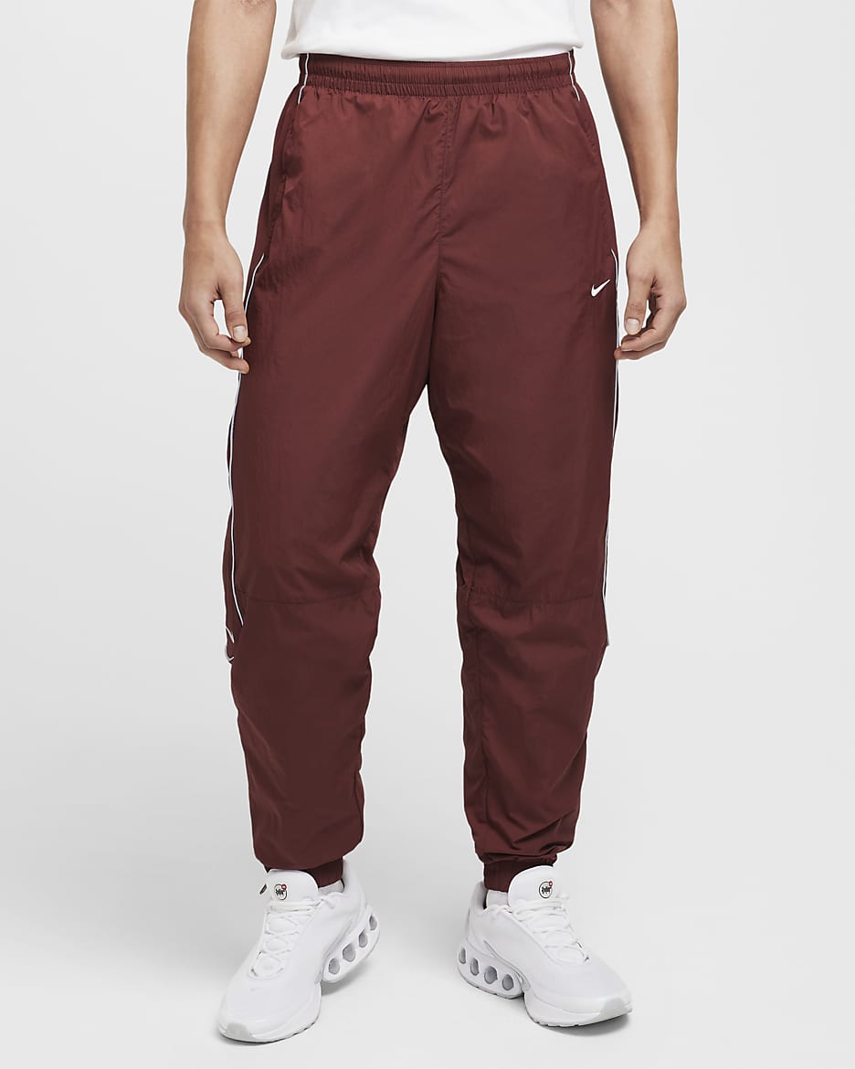 Pants de entrenamiento para hombre Nike Solo Swoosh - Poni oscuro/Blanco