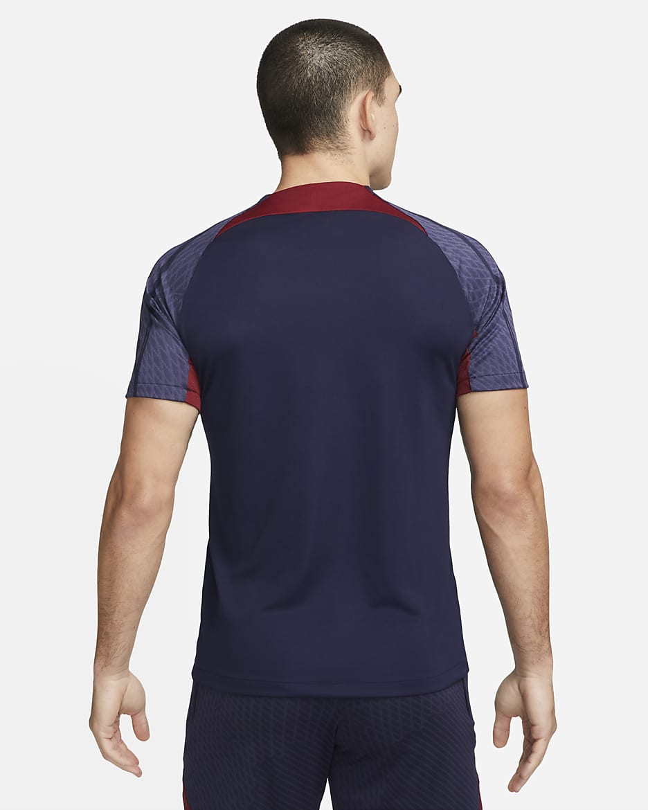 Paris Saint-Germain Strike Men's Nike Dri-FIT Knit Soccer Top - Blackened Blue/Blackened Blue/Team Red/Gold Suede