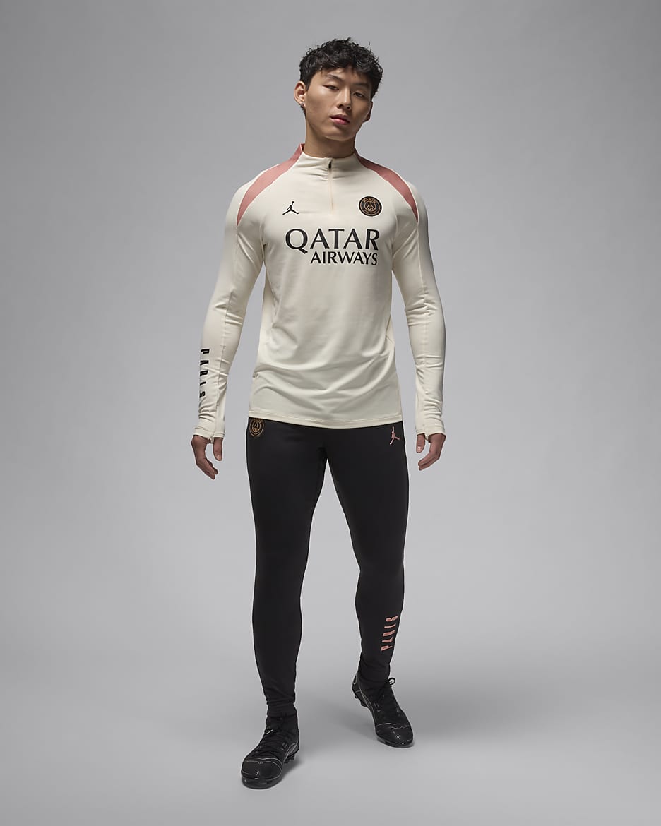 Męskie spodnie piłkarskie Jordan Dri-FIT Paris Saint-Germain Strike (wersja trzecia) - Czerń/Rust Pink/Rust Pink