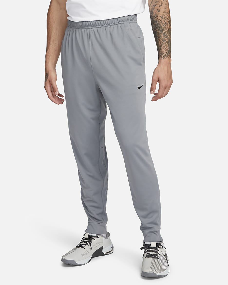 Pants Dri-FIT entallados versátiles para hombre Nike Totality - Gris humo/Negro