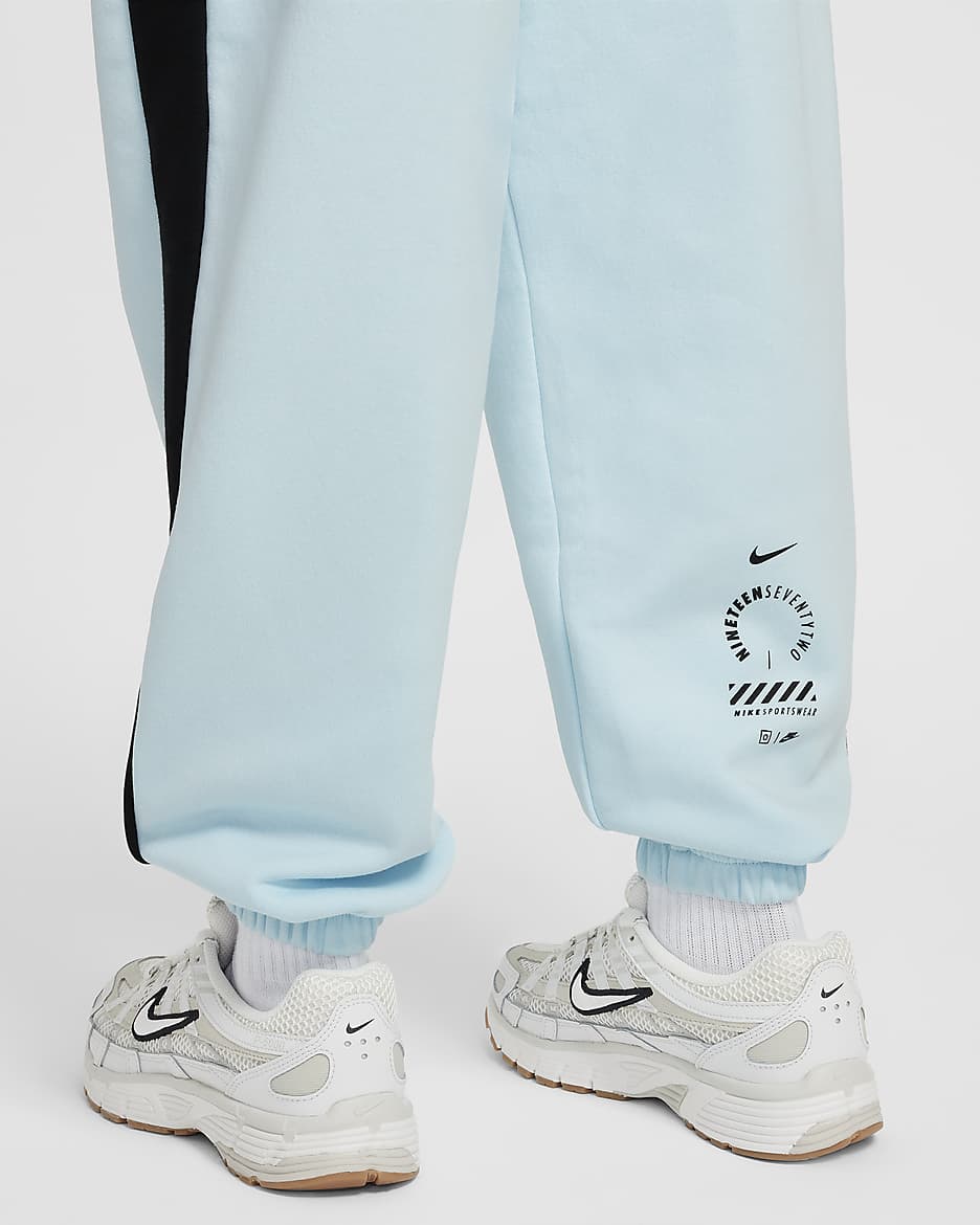 Nike Sportswear oversized joggingbroek van fleece voor meisjes - Glacier Blue/Zwart/Wit