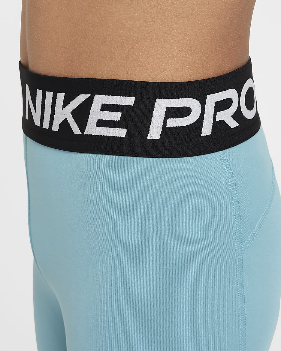 Nike Pro Dri-FIT-shorts (13 cm) til større børn (piger) - Denim Turquoise/hvid