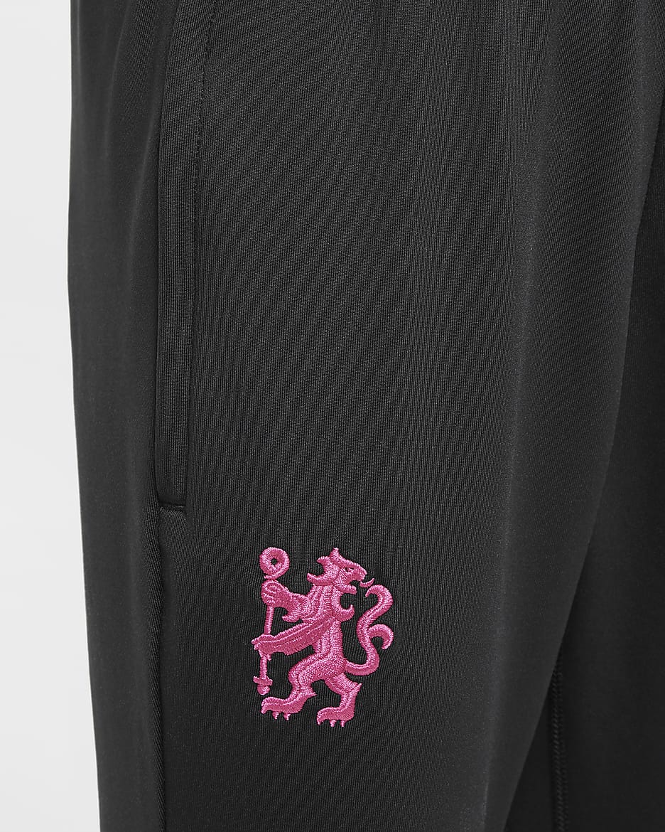 Pantaloni da calcio Nike Dri-FIT Chelsea FC Strike per ragazzo/a – Terza - Nero/Pink Prime