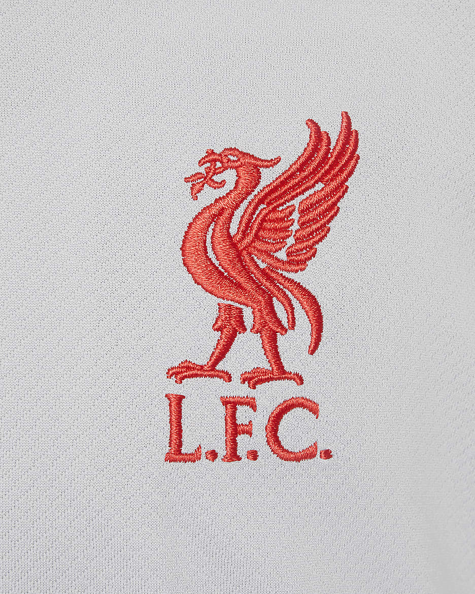 Dzianinowa koszulka piłkarska z krótkim rękawem dla dużych dzieci Nike Dri-FIT Liverpool F.C. Strike (wersja trzecia) - Light Smoke Grey/Light Smoke Grey/Chrome Yellow/Global Red