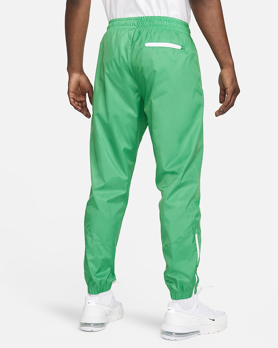 Vævede Nike Windrunner-bukser med for til mænd - Stadium Green/sort