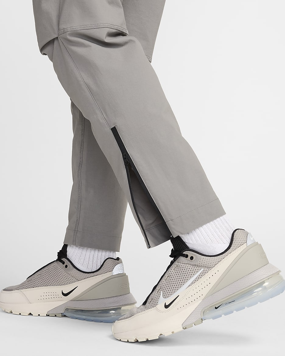 Pantaloni in tessuto Nike Tech – Uomo - Flat Pewter/Nero