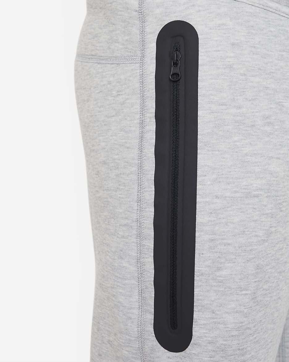 Nike Sportswear Tech Fleece Hose für ältere Kinder (Jungen) (erweiterte Größe) - Dark Grey Heather/Schwarz/Schwarz