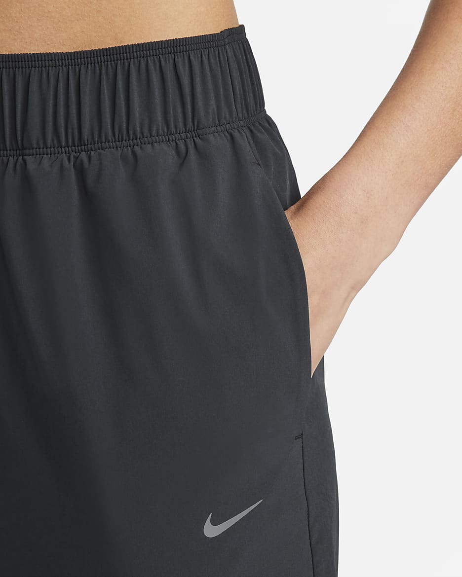 Nike Dri-FIT Fast 7/8-Laufhose mit mittelhohem Bund für Damen - Schwarz
