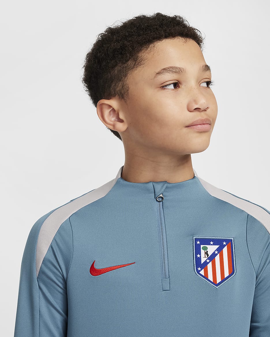 Atlético Madrid Strike Older Kids' Nike Dri-FIT Football Drill Top - Noise Aqua/Light Iron Ore/Light Crimson