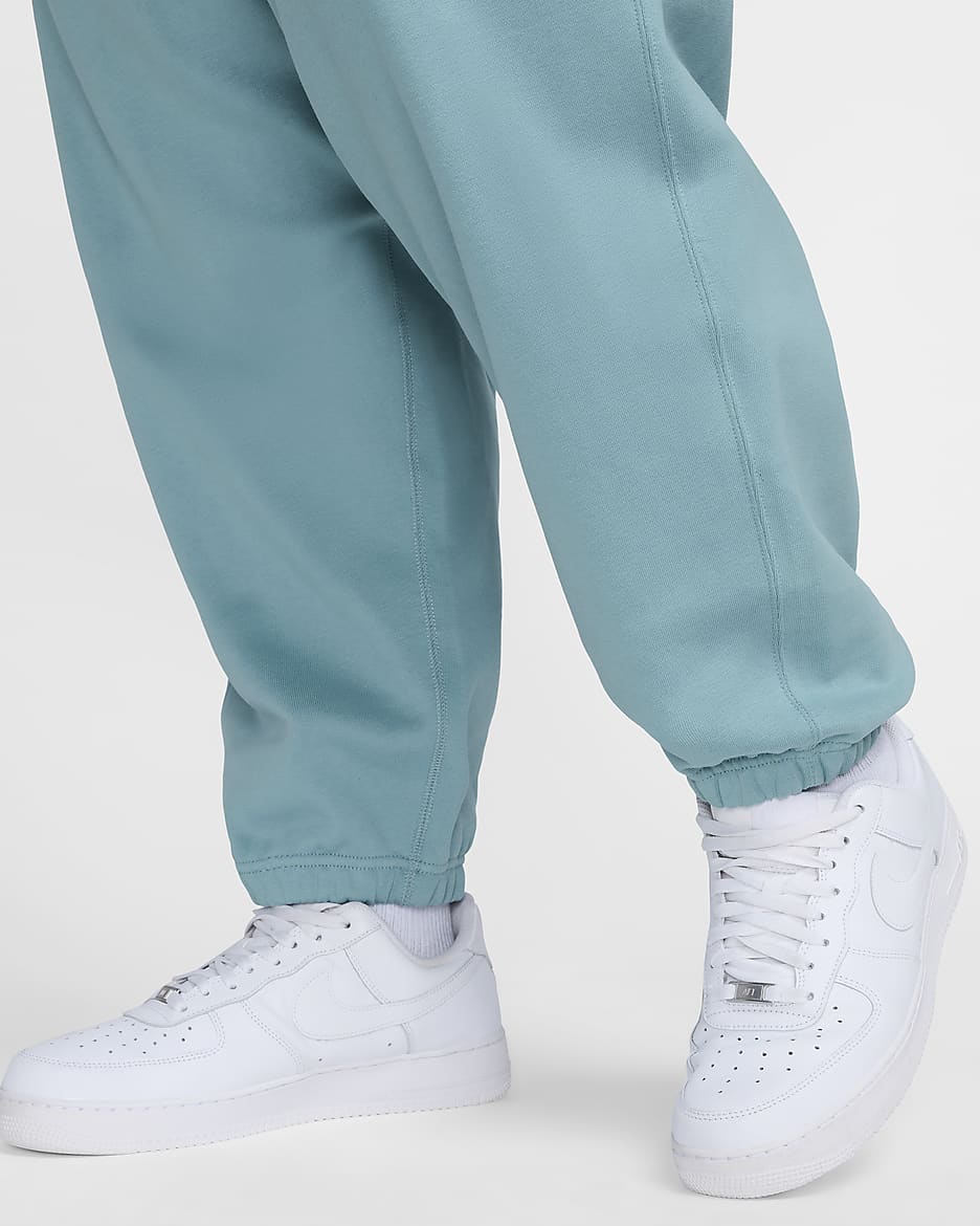 Nike Solo Swoosh Men's Fleece Trousers - Denim Turquoise/White