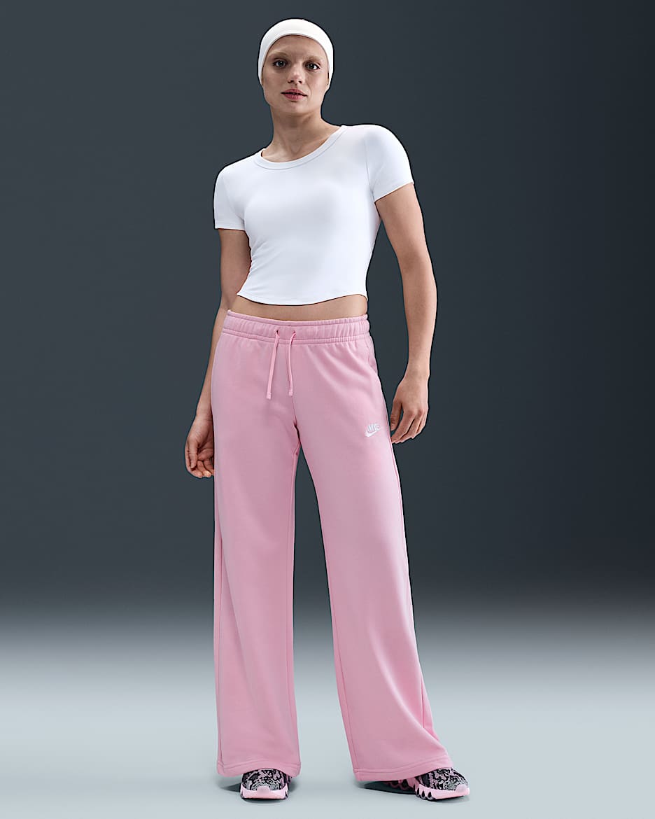 Pants de entrenamiento de piernas anchas de tiro medio para mujer Nike Sportswear Club Fleece - Rosa suave medio/Blanco