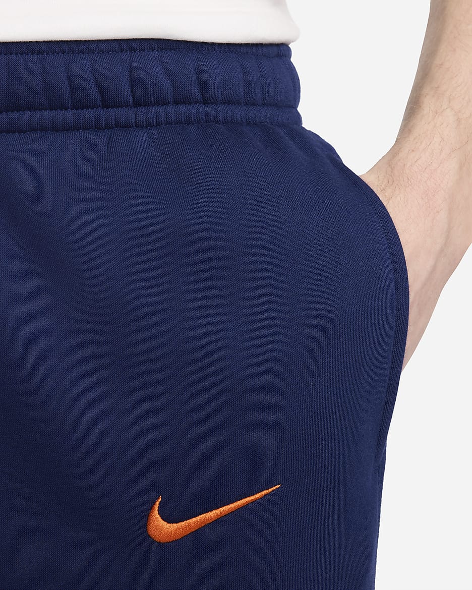 Netherlands Club Men's Nike Football Fleece Joggers - Blue Void/Safety Orange