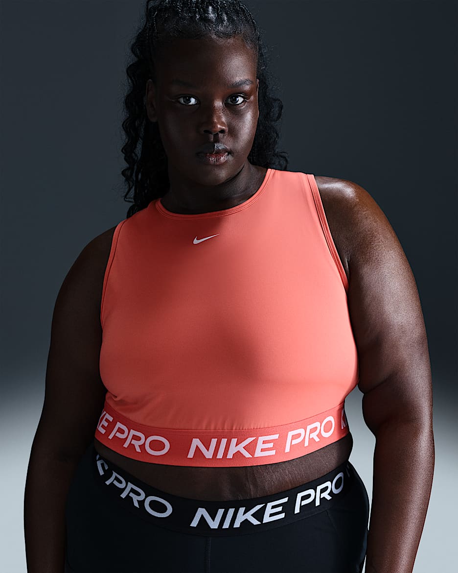 Camiseta de tirantes Dri-FIT cropped para mujer (talla grande) Nike Pro - Brasa mágica/Blanco