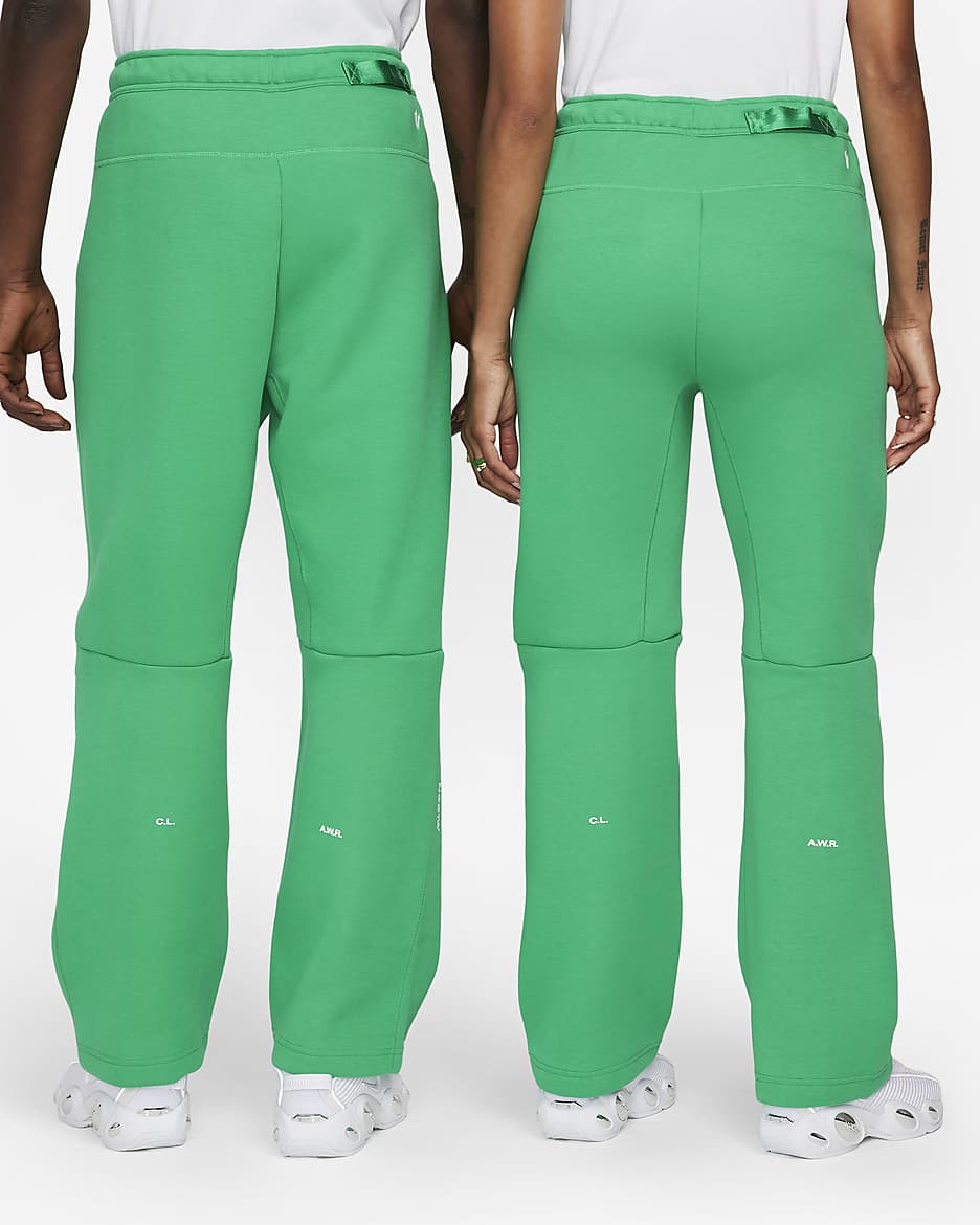 Pantaloni tuta con bordo aperto NOCTA Tech Fleece – Uomo - Stadium Green/Sail